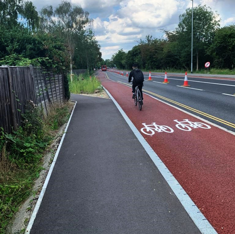 Histon Rd Cyclist on new cycle lane