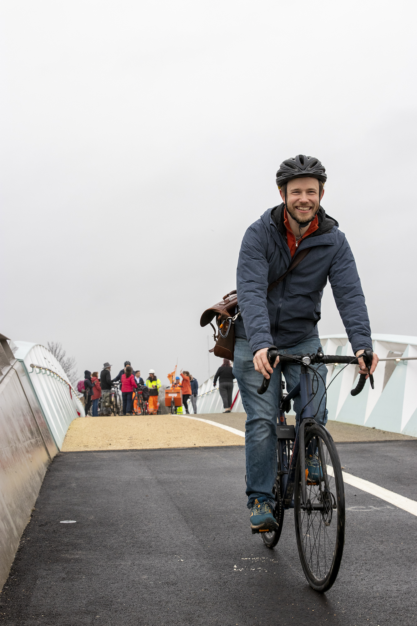 Cyclist on AC bridge