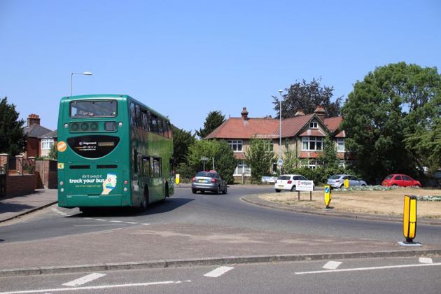 Milton Rd roundabout green bus
